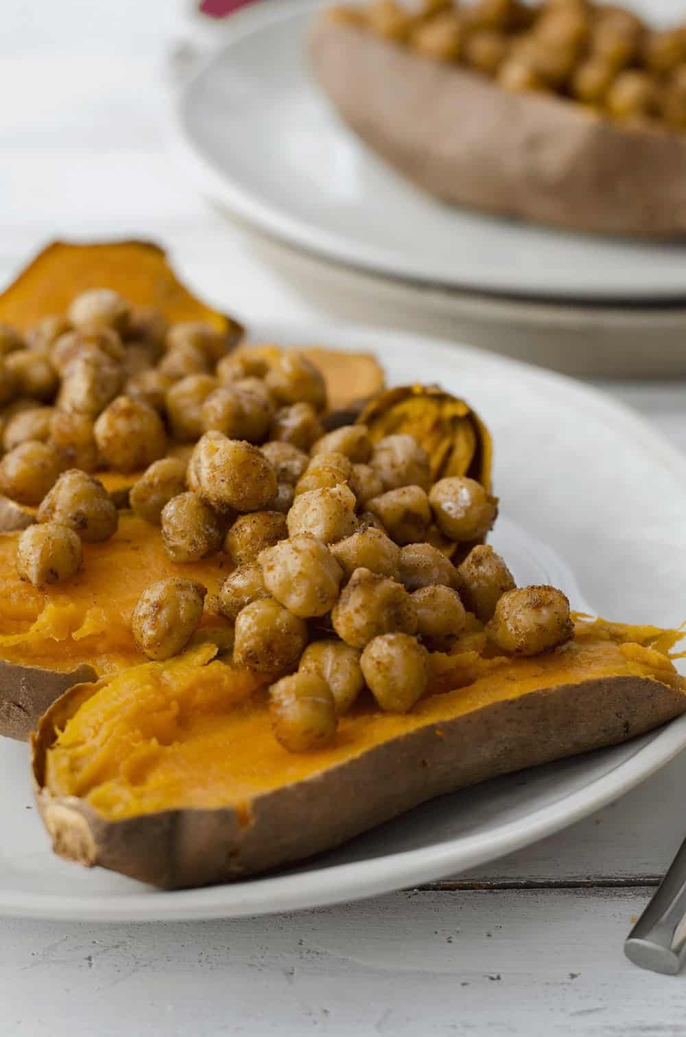 Vegan Stuffed Sweet Potatoes! Roasted Sweet Potatoes Stuffed With Spiced Chickpeas, Garlic Tahini Sauce And Fresh Herbs. Gluten-Free. | Www.delishknowledge.com