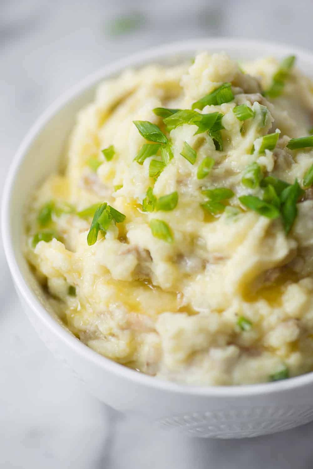 Bowl Of Mashed Potatoes With Butter And Chives