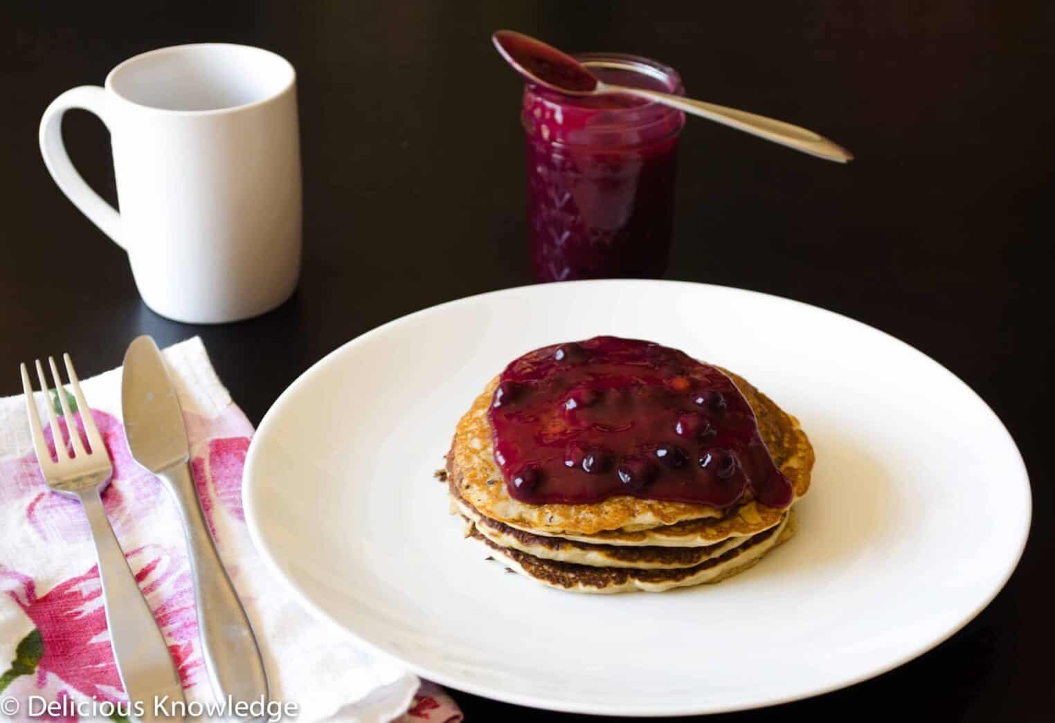 Oatmeal Pancakes with fresh blueberry glaze! Healthy, vegan, and perfect for a lazy brunch or weekday breakfast. 