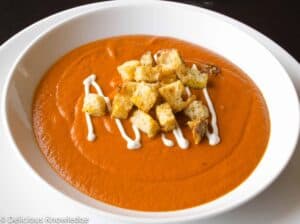 Creamy tomato bisque made with sundried tomatoes. Topped with homemade croutons and vegan cream.