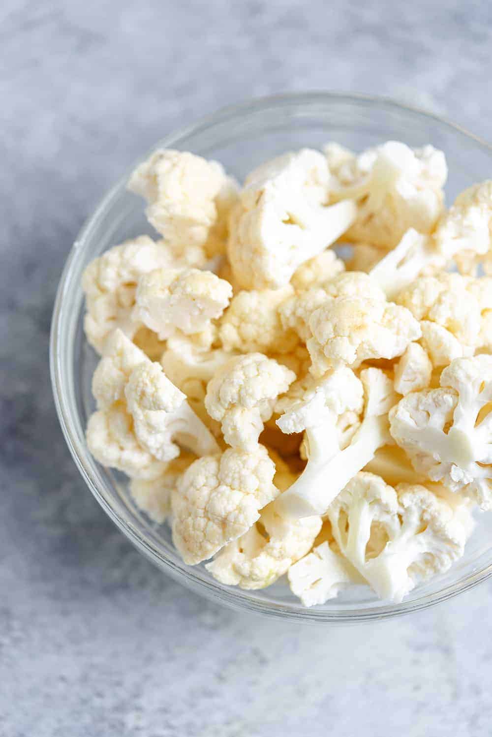 bowl of cauliflower to make vegan buffalo wings