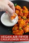 dipping buffalo wings in vegan ranch dressing