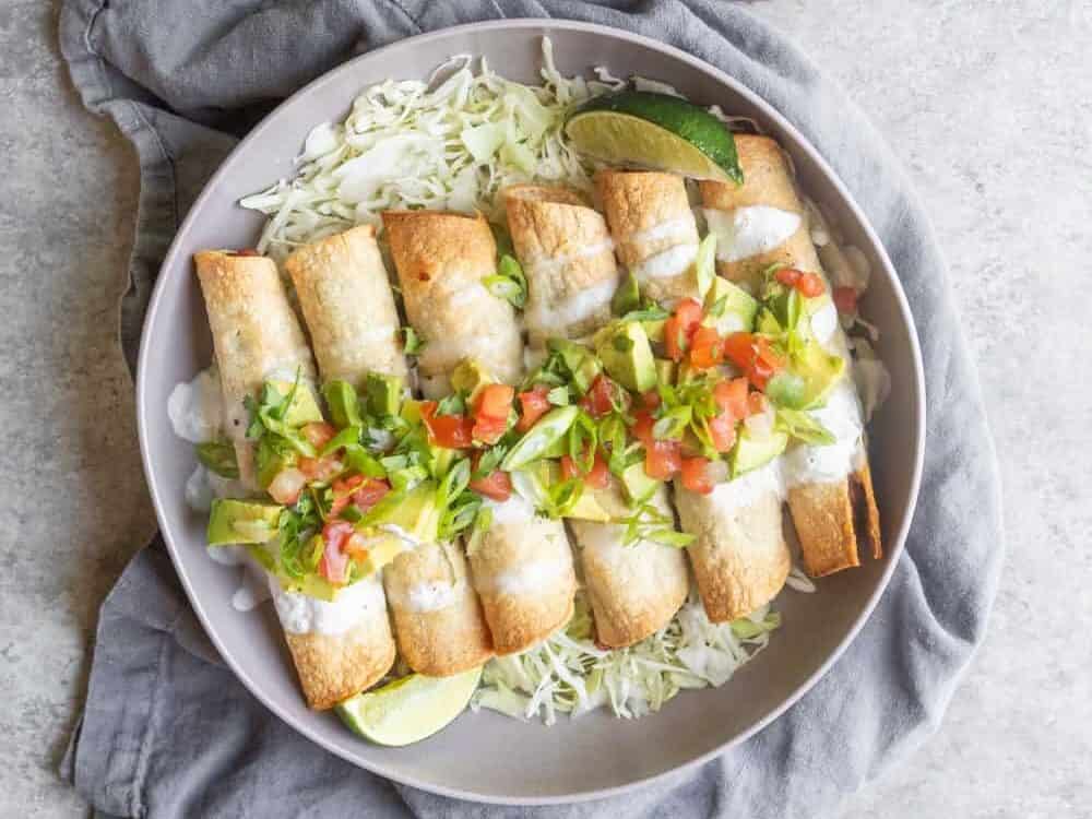 12 Recipes that Cost $10 or Less 11 Air Fryer Black Bean Taquitos With Guacamole And Tomatoes