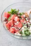 bowl of arugula, watermelon and feta salad