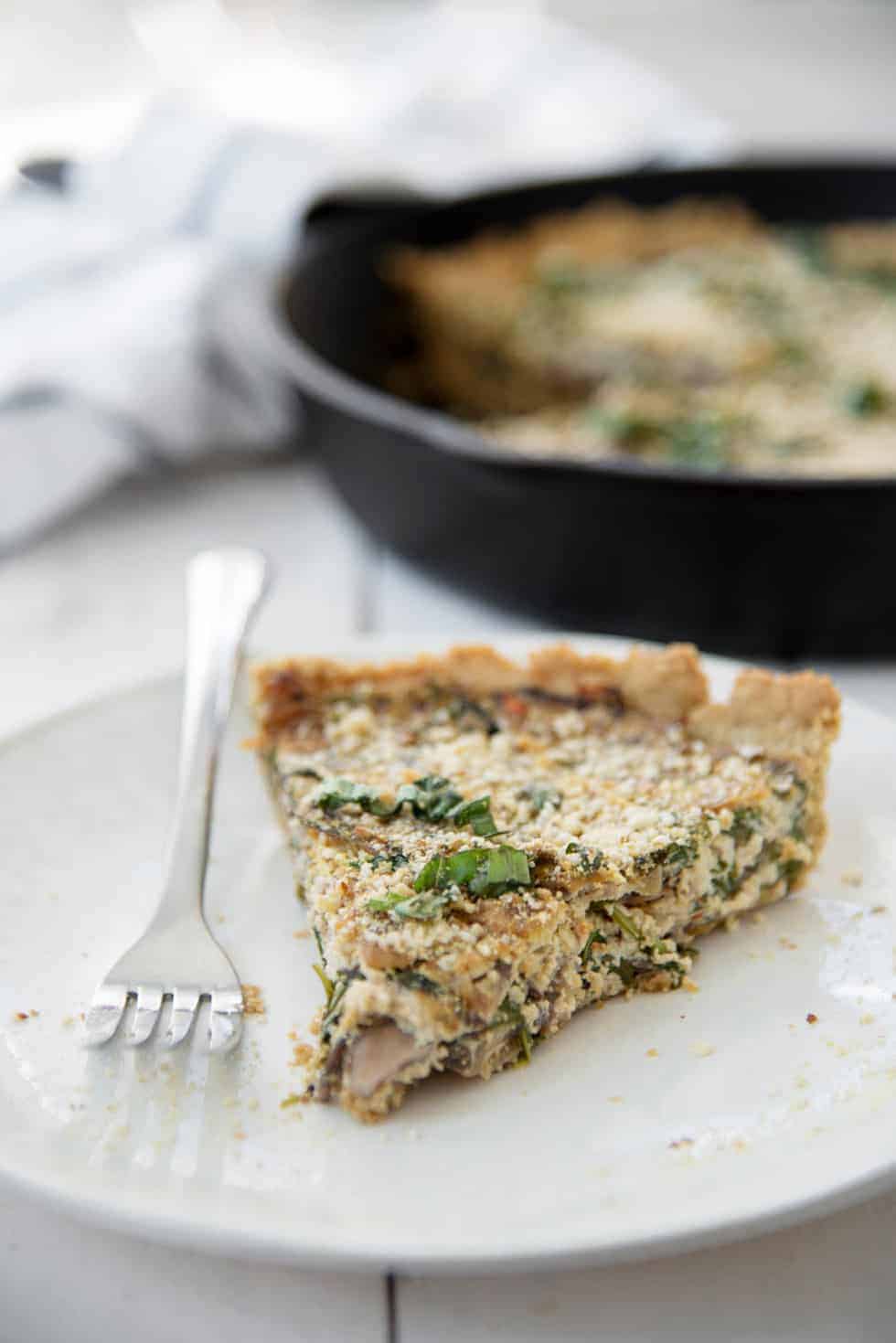 Vegan And Gluten-Free Arugula And Mushroom Quiche! Oat Crust Topped With Mushroom And Arugula Tofu Filling. Hearty Meal, Perfect For Brunch, Breakfast Or Dinner. | Www.delishknowledge.com