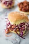 vegan bbq tempeh sandwich with coleslaw