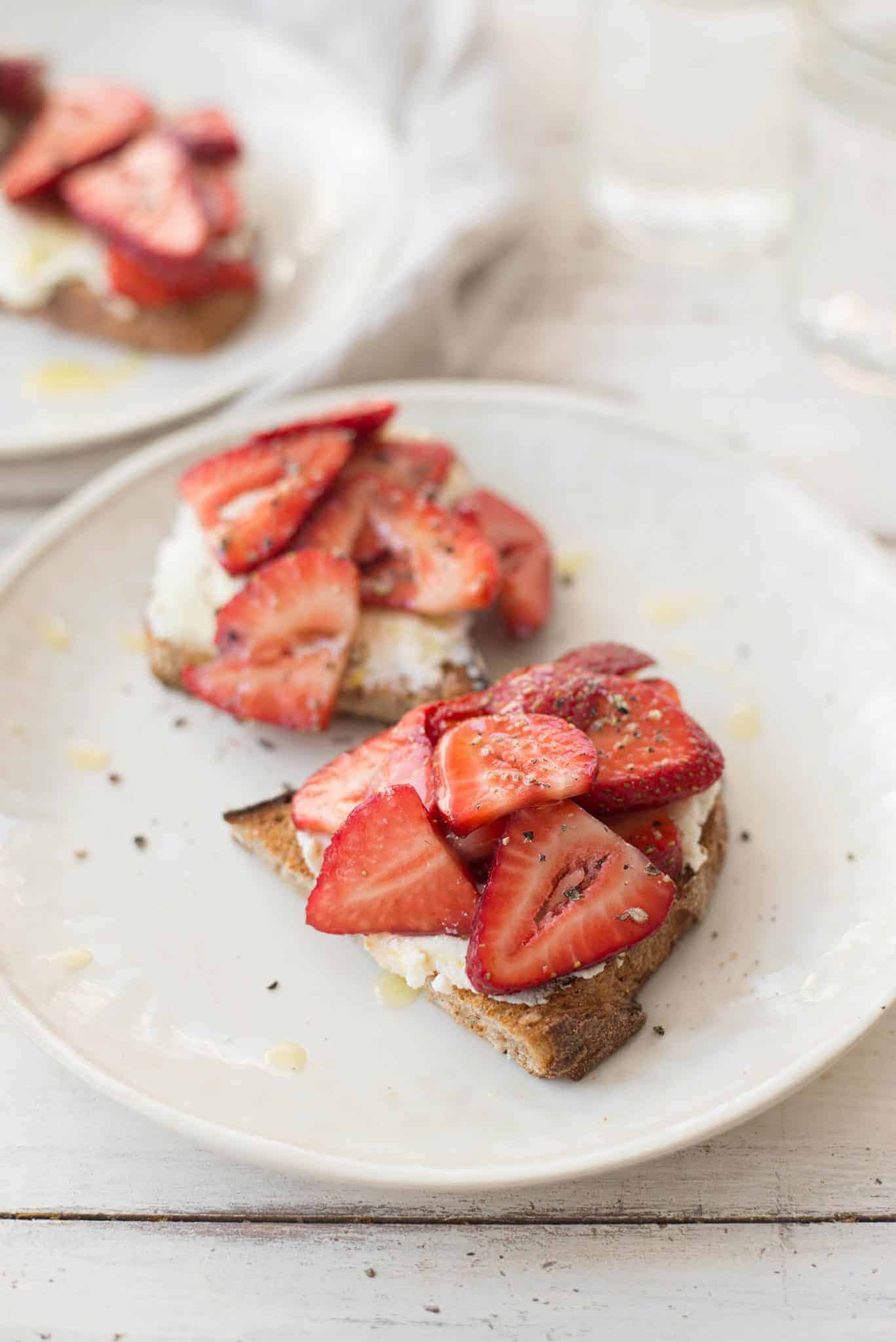 Balsamic Strawberry Ricotta Toast. The Perfect Breakfast For This Time Of Year. Balsamic Soaked Berries Spooned Onto Thick Toast With Orange Ricotta. | Delishknowledge.com