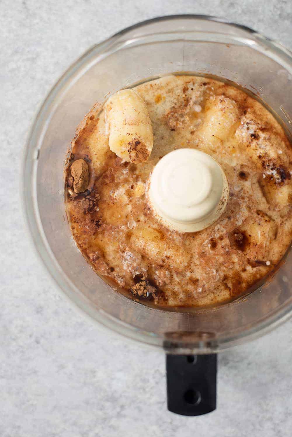 food processor with vegan muffin ingredients 