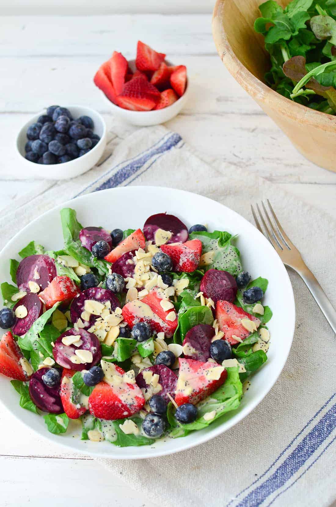 Beet And Berry Salad With Dairy-Free Poppy Seed Dressing! This Salad Is Packed With Nutrients And Perfect For Lunch Or Dinner! | Www.delishknowledge.com