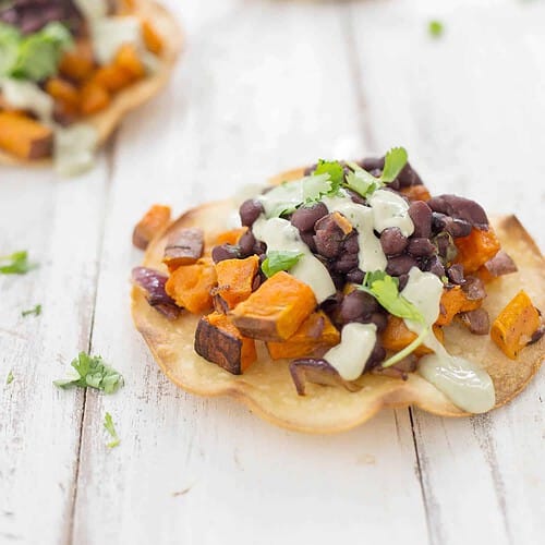 Black Bean and Sweet Potato Tostadas 6 Black Bean And Sweet Potato Tostadas! Seasoned Black Beans Piled High With Roasted Sweet Potatoes, Covered With Avocado Creme. Vegan &Amp; Glutenfree | Www.delishknowledge.com