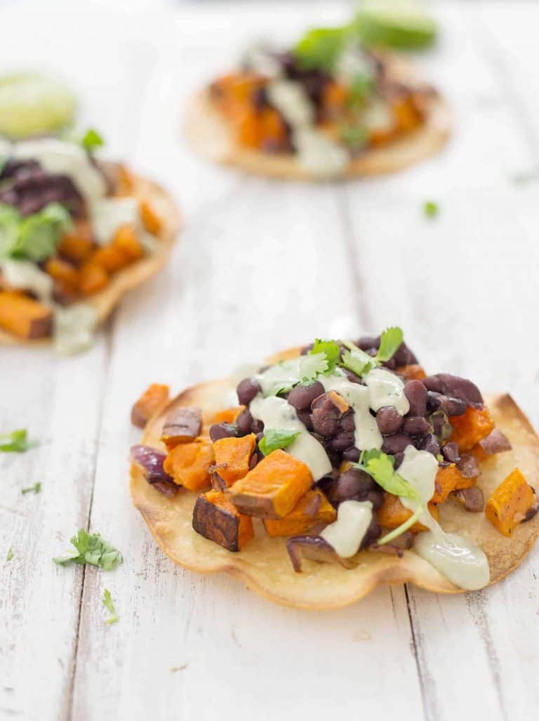 Black Bean And Sweet Potato Tostadas! Seasoned Black Beans Piled High With Roasted Sweet Potatoes, Covered With Avocado Creme. Vegan &Amp; Glutenfree | Www.delishknowledge.com