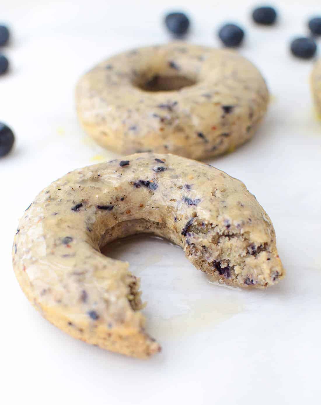 Blueberry Lemon Chia Donuts! Vegan cake donuts that are packed with fiber and omega-3 fatty acids! Perfect for breakfast, snack or dessert! |www.delishknowledge.com