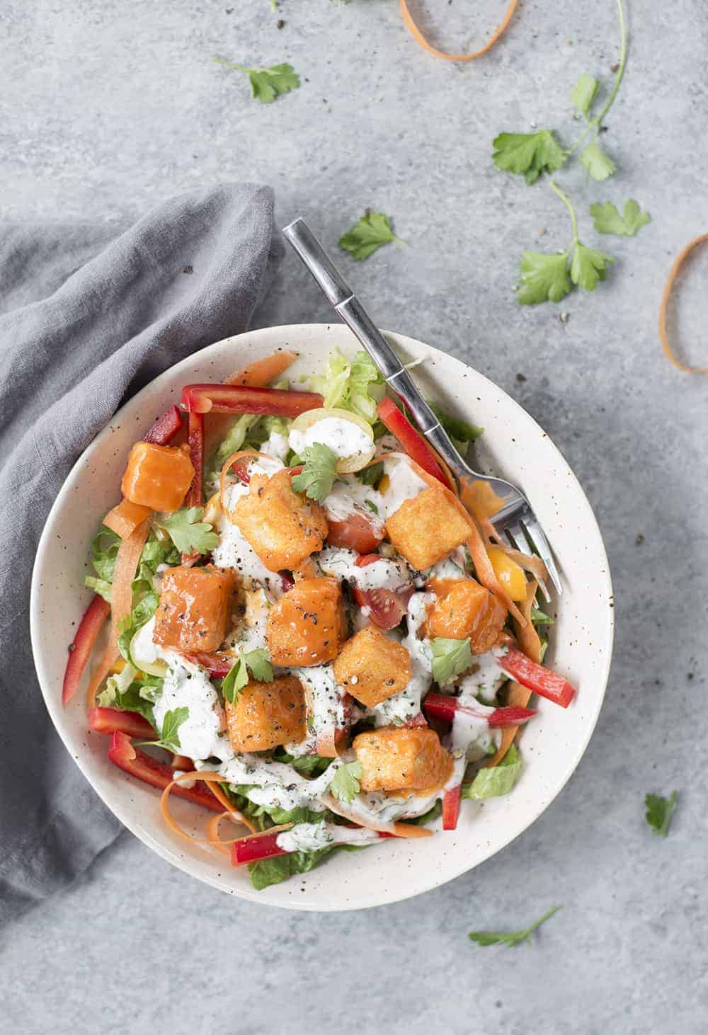 Vegetarian Chicken Salad In A Bowl With A Fork Garnished With Fresh Herbs 