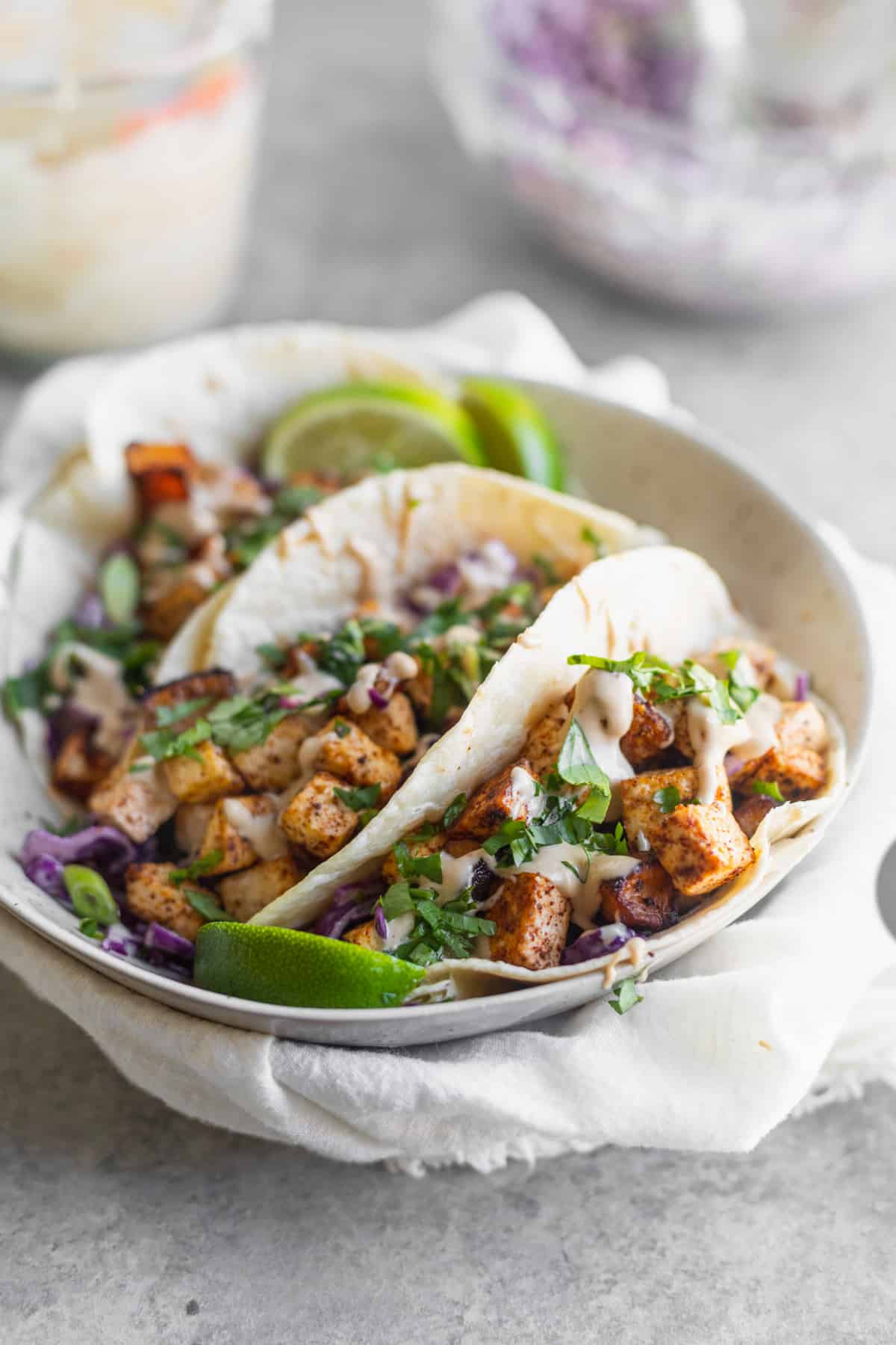 Bowl Of Butternut Squash Tacos With Slaw And Limes