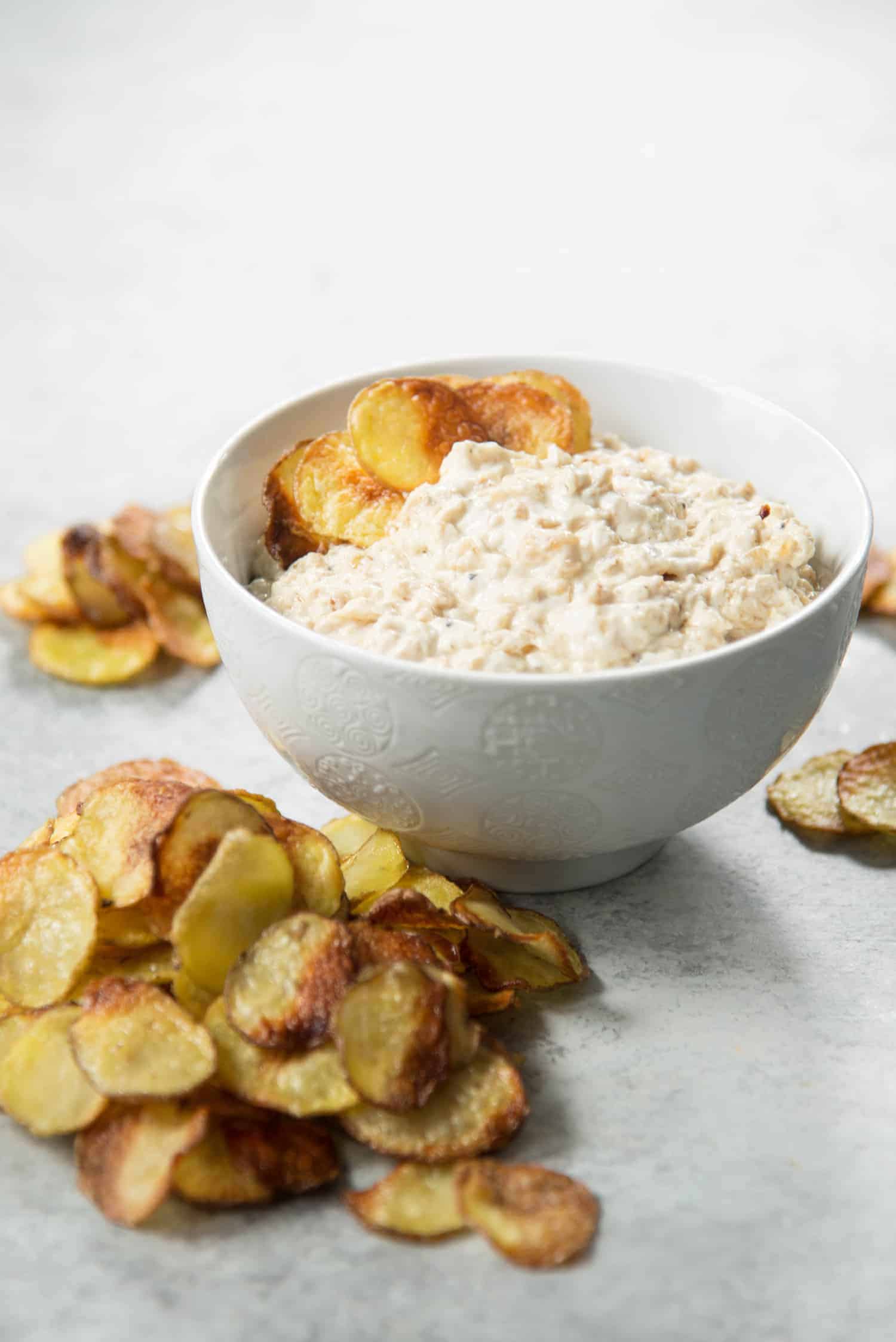 Caramelized Onion Dip 3 Caramelized Onion Dip With Baked Potato Chips! This Appetizer Is Perfect For Summer; Easy Caramelized Onion Dip Made With Greek Yogurt And Homemade Baked Potato Chips With Less Oil Than Traditional Chips. Vegetarian, Easily Vegan Using Dairy-Free Versions. | Www.delishknowledge.com