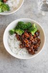 tofu stir fry with cashews and broccoli in a bowl