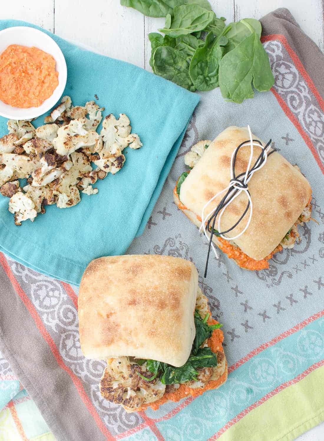 The Best Vegan Sandwich! Crispy Cauliflower, Garlic Spinach And Quick Romesco Sauce. Perfect For Picnics, Lunch, Or Easy Dinners. #Vegetarian #Vegan #Healthy | Www.delishknowledge.com