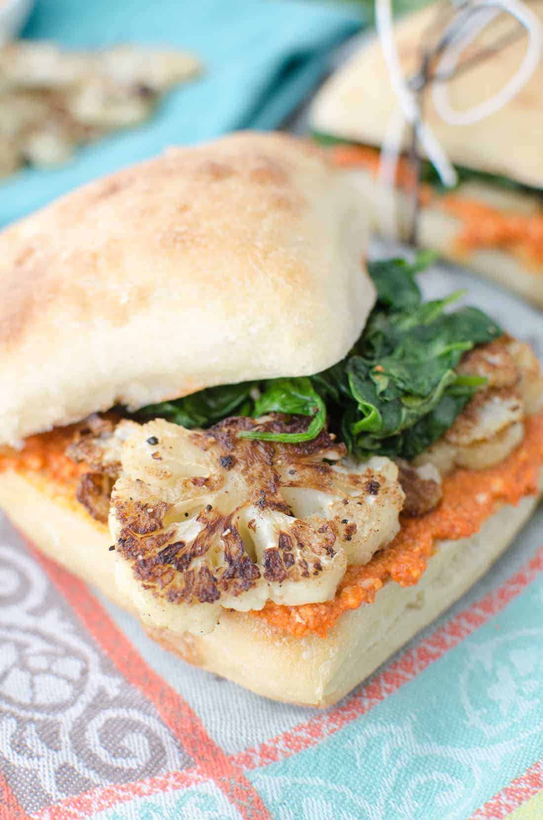 The Best Vegan Sandwich! Crispy Cauliflower, Garlic Spinach And Quick Romesco Sauce. Perfect For Picnics, Lunch, Or Easy Dinners. #Vegetarian #Vegan #Healthy | Www.delishknowledge.com