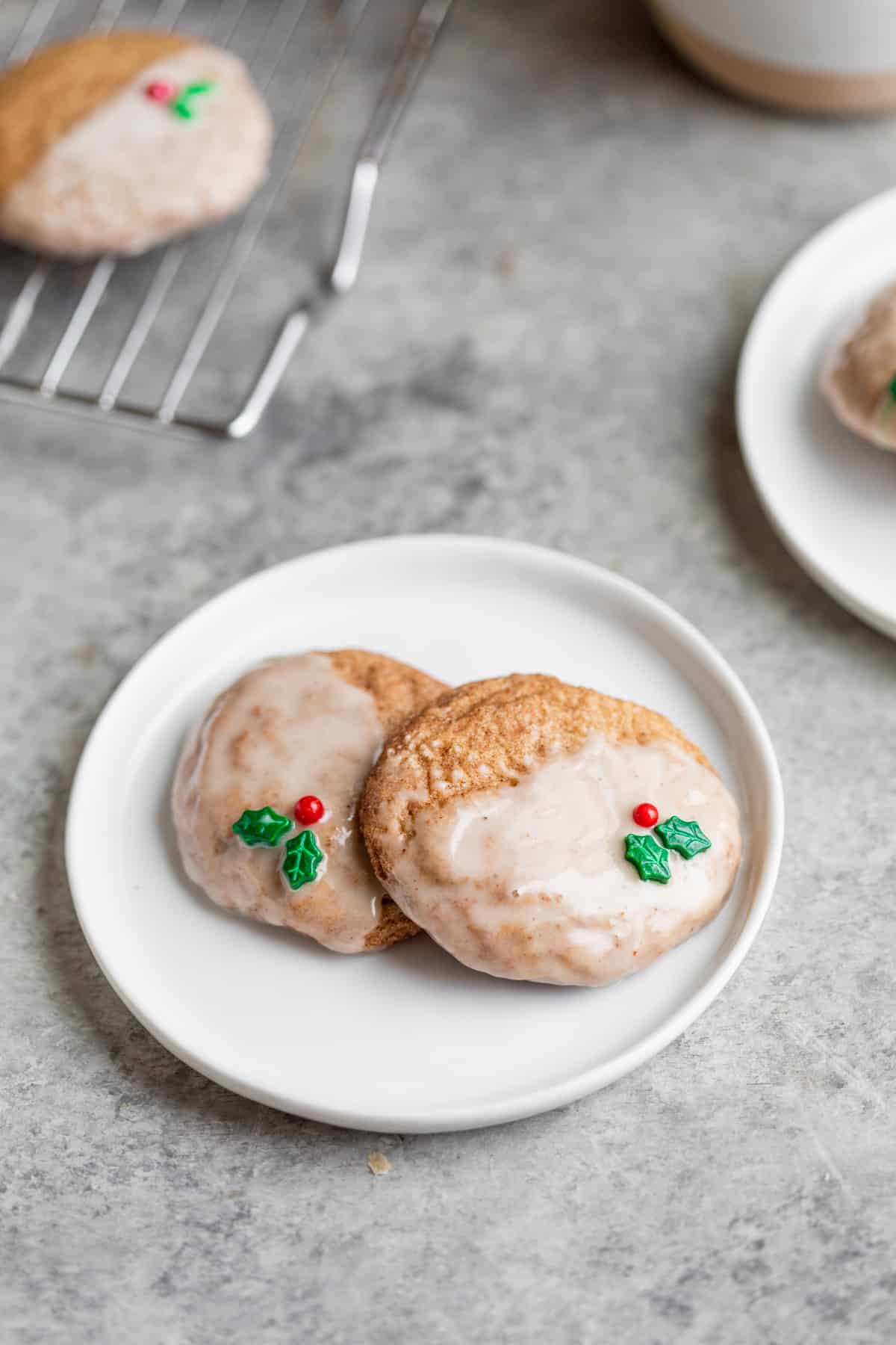 Multiple Chai Vegan Sugar Cookies With Frosting On A Plate