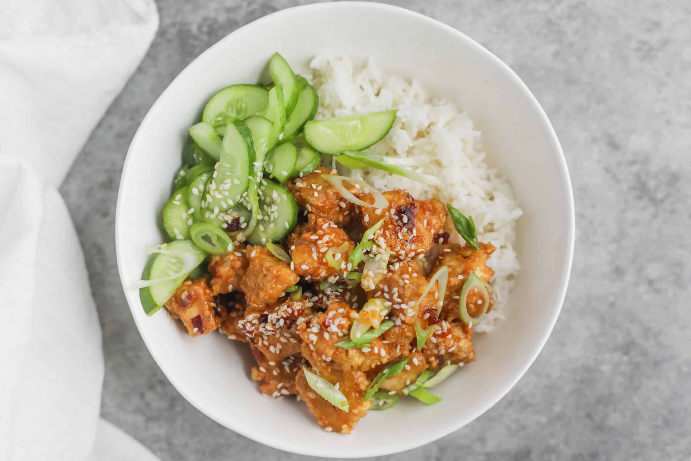 Chili Crisp Tofu Bowls with Cucumber Salad and Rice - Delish Knowledge