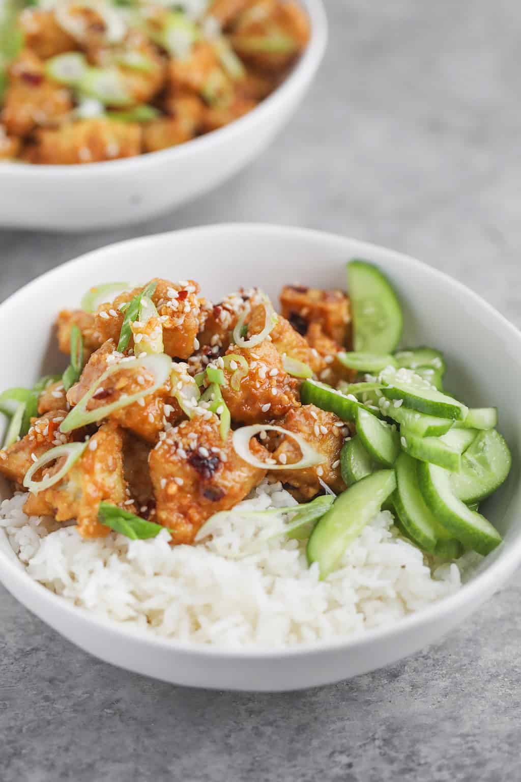Chili Crisp Tofu Bowls with Cucumber Salad and Rice - Delish Knowledge
