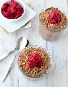 Chocolate Raspberry Mousse Parfait Cups! Healthy chocolate mousse cups layered with date and almond crust. Vegan, gluten-free, and mostly raw.