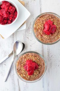 Chocolate Raspberry Mousse Parfait Cups! Healthy chocolate mousse cups layered with date and almond crust. Vegan, gluten-free, and mostly raw.
