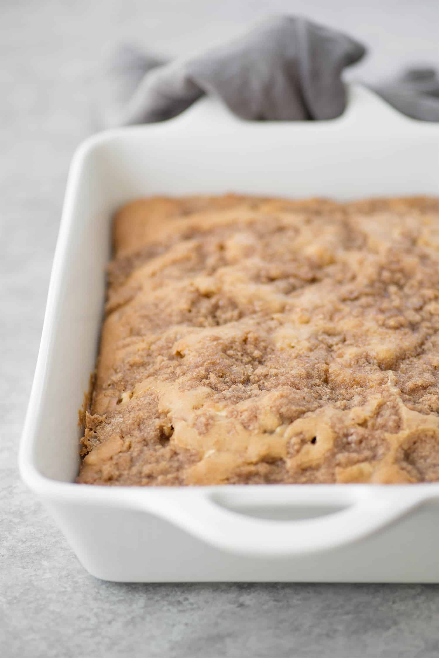 Cinnamon Spice Apple Cake! Similar To A Coffee Cake, Perfect For Brunch. This Cake Is Packed With Fresh Apples And Spices And Topped With Cinnamon-Sugar. A Must-Make For Fall. | Www.delishknowledge.com