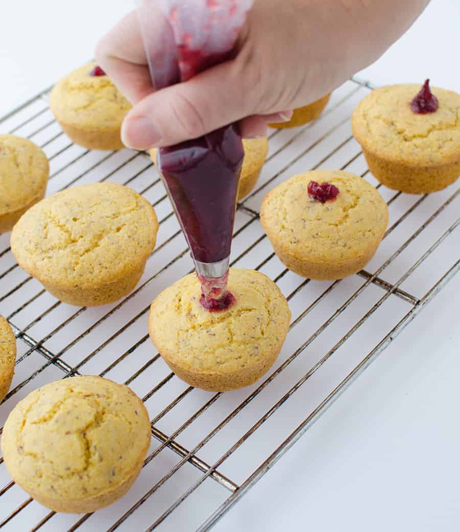 Get Your Bread Baskets Ready! These Jam Filled Corn Muffins Are The Perfect Sweet &Amp; Savory Side To Enjoy On It'S Own Or With A Full Plate Of Thanksgiving Favorites. Vegan Corn Muffins Stuffed With Cranberry Jam. | Www.delishknowledge.com