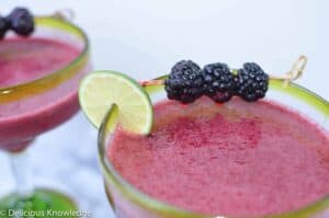 Garnish With Lime Slices And Fresh Blackberries 