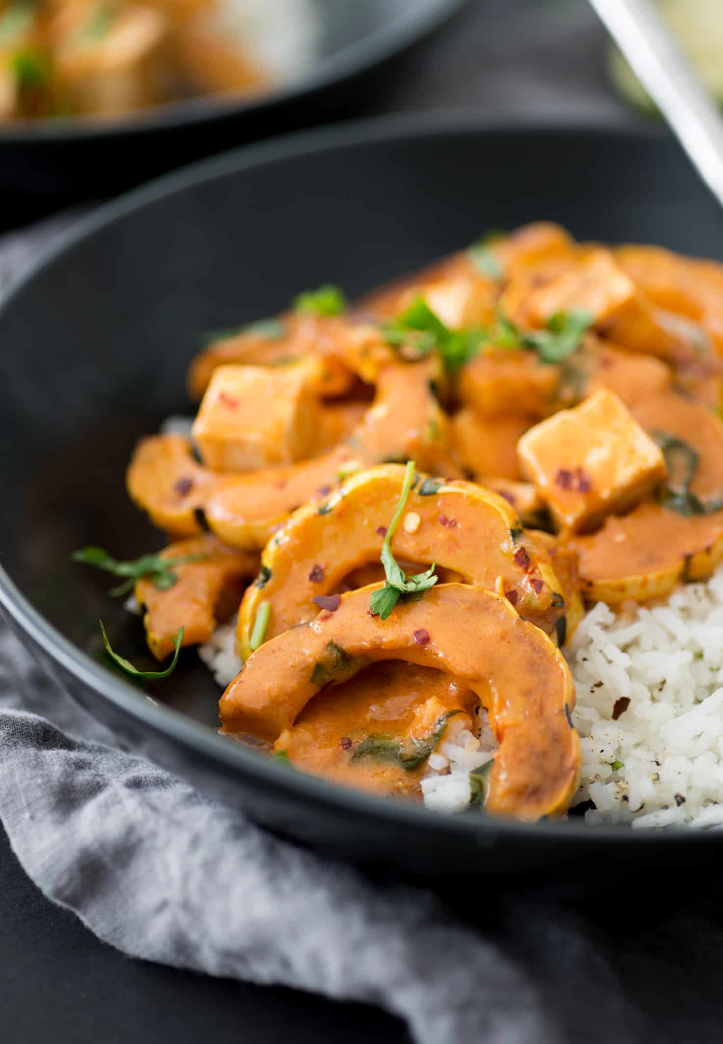 Vegan Delicata Squash Red Curry! If You'Re Looking For A Healthy, Plant-Based Dinner- This Is It! Simmered Tofu And Squash In A Mild Red Curry Sauce. Easily Gluten-Free. | Www.delishknowledge.com