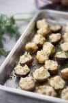 Deviled Potatoes! These mini potatoes are the perfect Spring appetizer. Crispy potato shells stuffed with deviled dill potato filling. Vegan and Gluten-Free. | www.delishknowledge.com