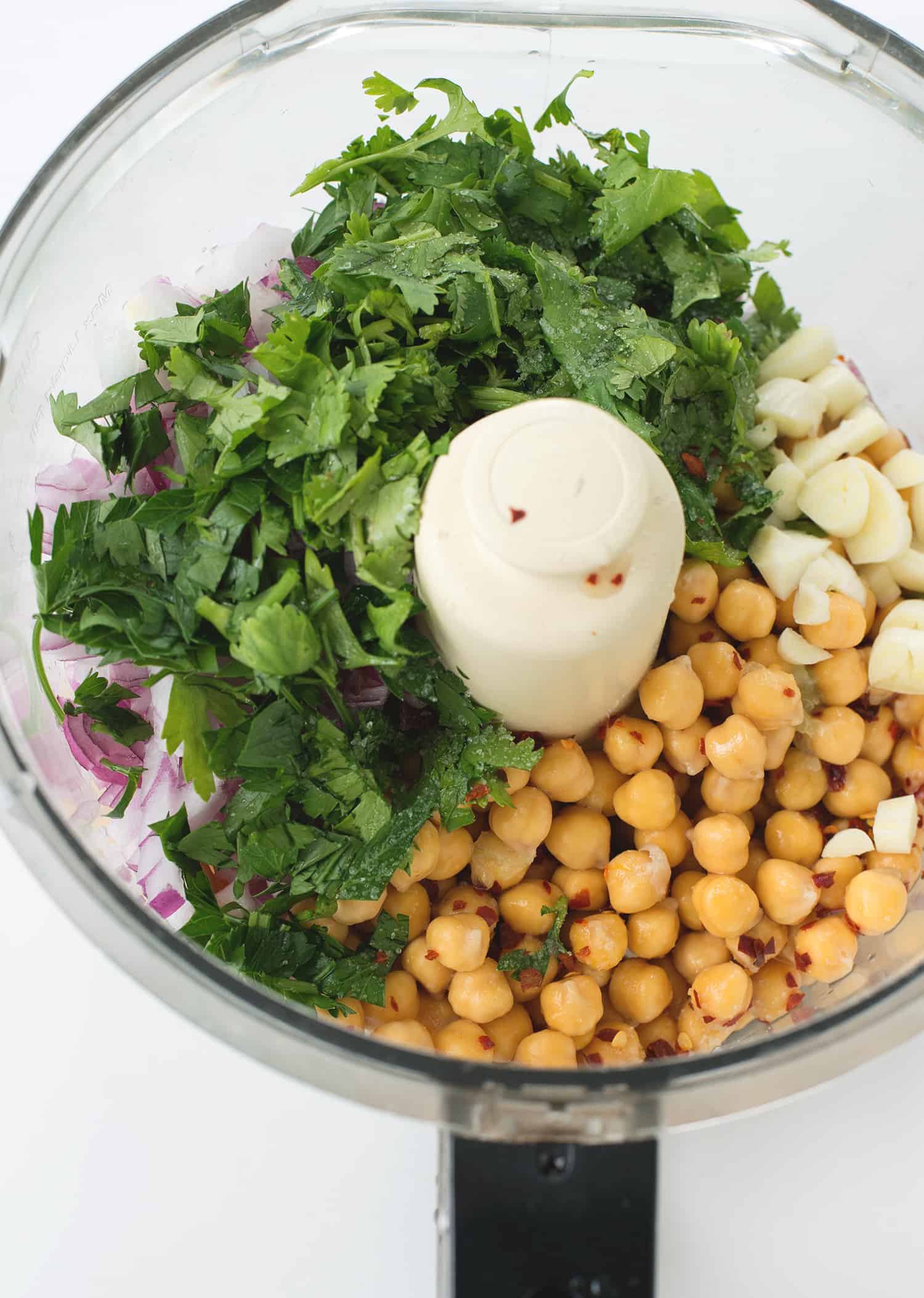 Falafel Salad With Tahini Parsley Dressing! Crispy Vegan Falafel Patties On Top Of Salad With Tahini Parsley Dressing. | Www.delishknowledge.com