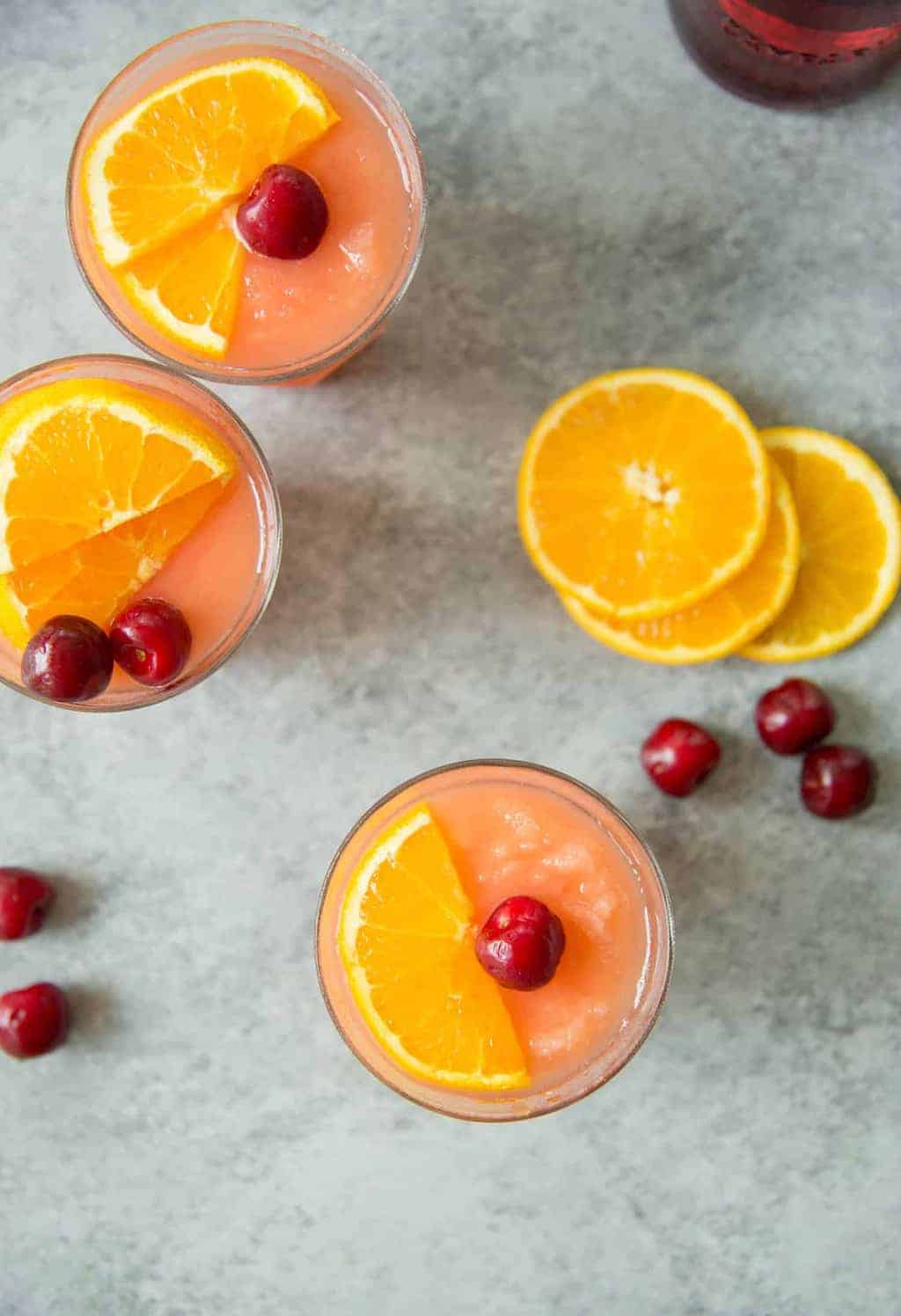 This Is The Drink For Summer. A Frozen Orange-Ginger Negroni Slush, Perfect For Hot Days. Campari, Gin, Vermouth, Ginger Syrup And Orange Juice. | Www.delishknowledge.com