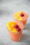 This is THE drink for summer. A frozen orange-ginger negroni slush, perfect for hot days. Campari, gin, vermouth, ginger syrup and orange juice. | www.delishknowledge.com