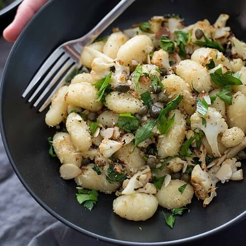 Vegan Gnocchi With Roasted Cauliflower And Lemon! This Dinner Is Perfect For Fall; Crispy Roasted Cauliflower, Capers, Garlic Breadcrumbs, Gnocchi And Fresh Lemon Juice. A Must-Make. | Www.delishknowledge.com