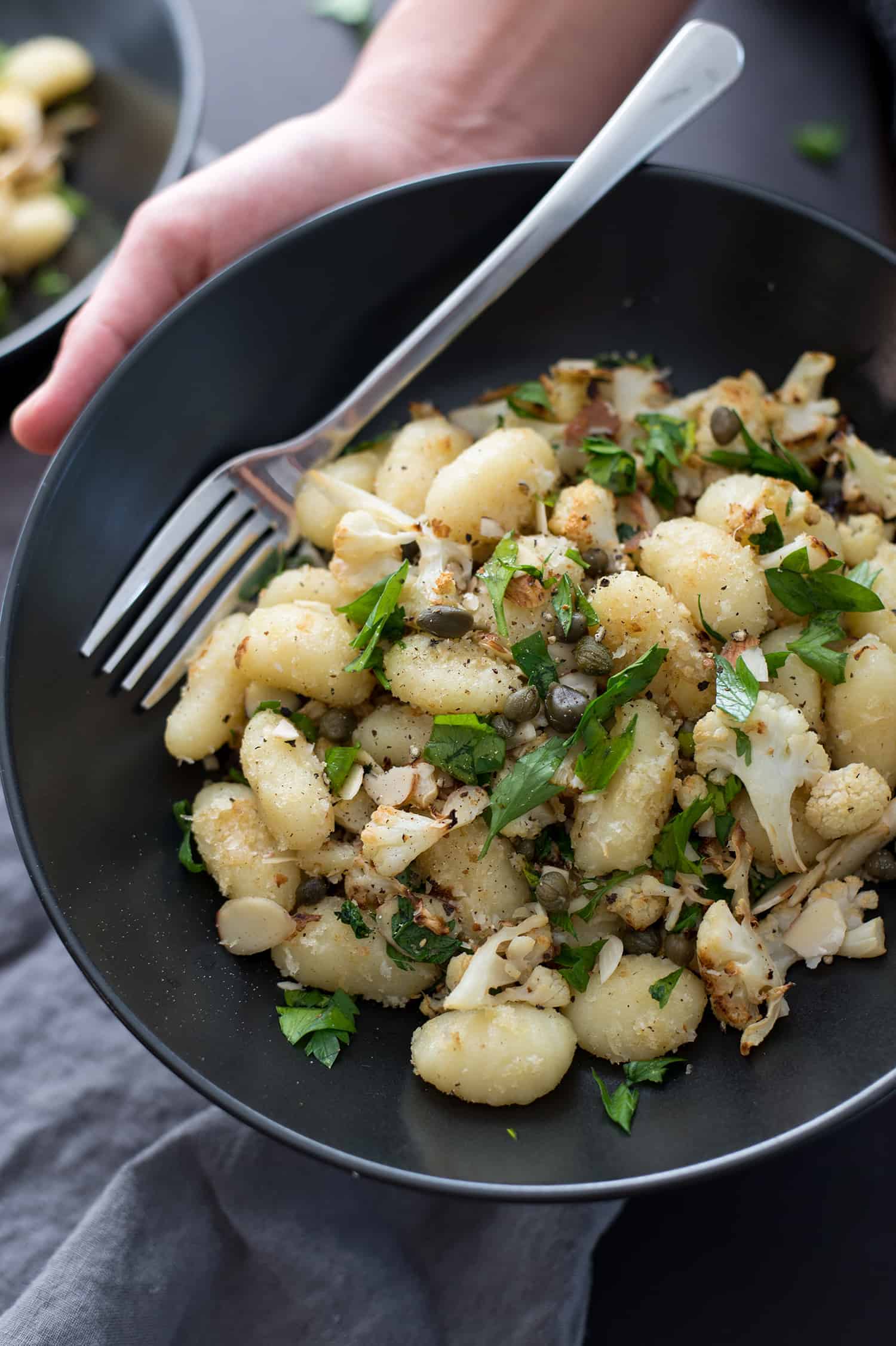 Vegan Gnocchi With Roasted Cauliflower And Lemon! This Dinner Is Perfect For Fall; Crispy Roasted Cauliflower, Capers, Garlic Breadcrumbs, Gnocchi And Fresh Lemon Juice. A Must-Make. | Www.delishknowledge.com 