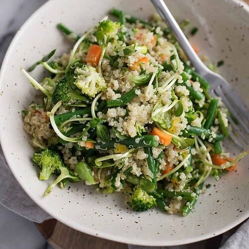 Green Bean, Quinoa And Sprout Salad! This Lettuce-Free Salad Is Perfect For Lunch Or A Light Dinner. Green Beans, Broccoli, Quinoa, Carrots And Sprouts Tossed In A Fresh Dressing. Vegan And Gluten-Free | Www.delishknowledge.com