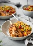 The perfect summer dinner! Grilled succotash with BBQ tofu kebobs. So flavorful and easy! Vegan and gluten-free. | www.delishknowledge.com