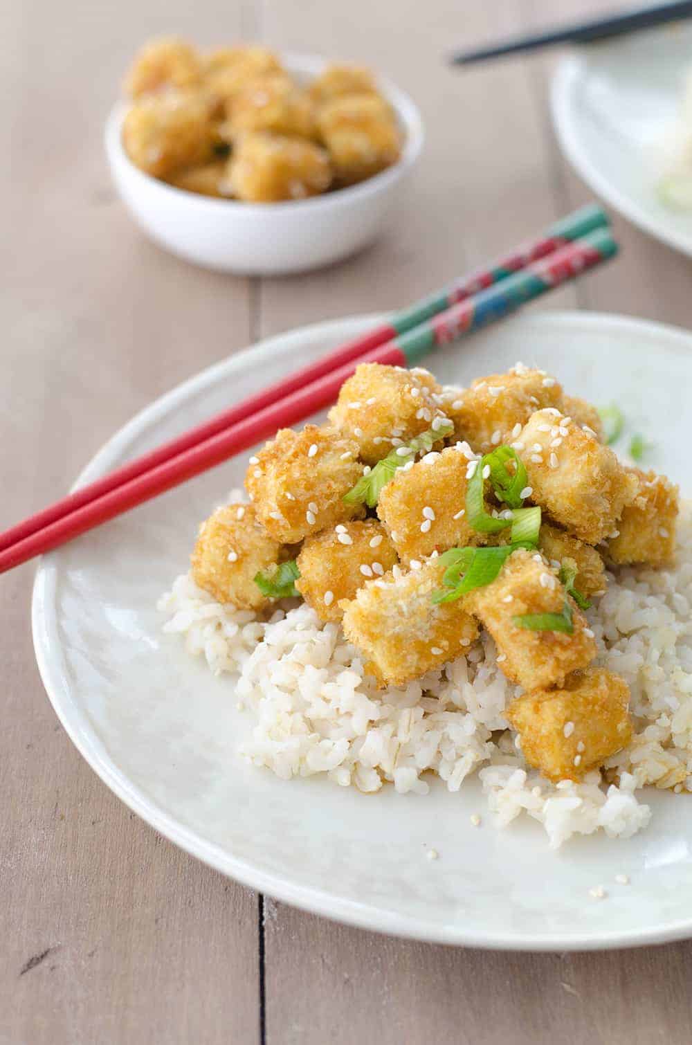 Crispy Honey Garlic Tofu! Better Than Takeout! Crispy Baked Tofu Nuggets In A Sweet Garlic Sauce. Perfect Over Brown Rice Or Steamed Vegetables! Vegetarian. | Www.delishknowledge.com