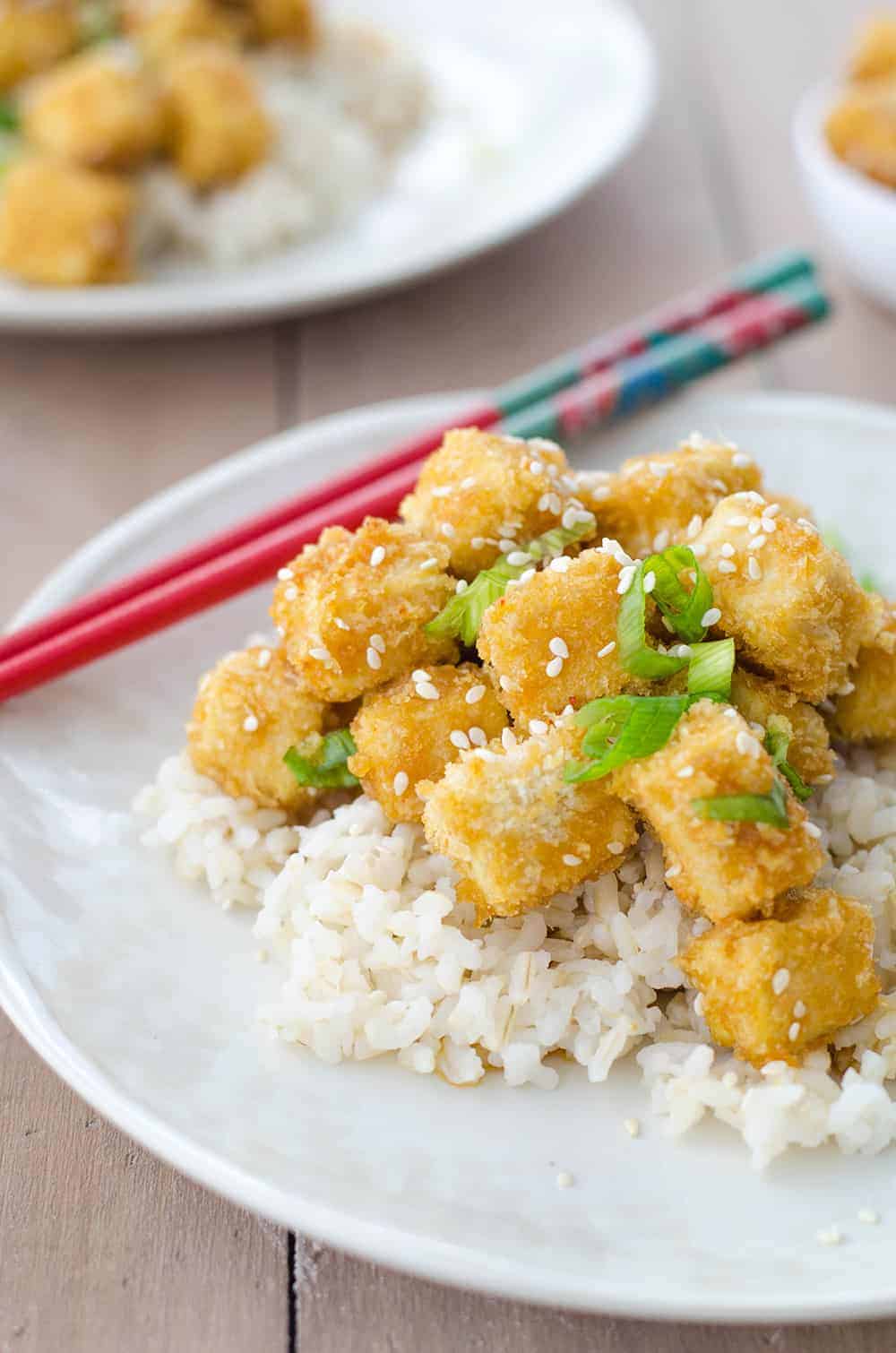 Crispy Honey Garlic Tofu! Better Than Takeout! Crispy Baked Tofu Nuggets In A Sweet Garlic Sauce. Perfect Over Brown Rice Or Steamed Vegetables! Vegetarian. | Www.delishknowledge.com