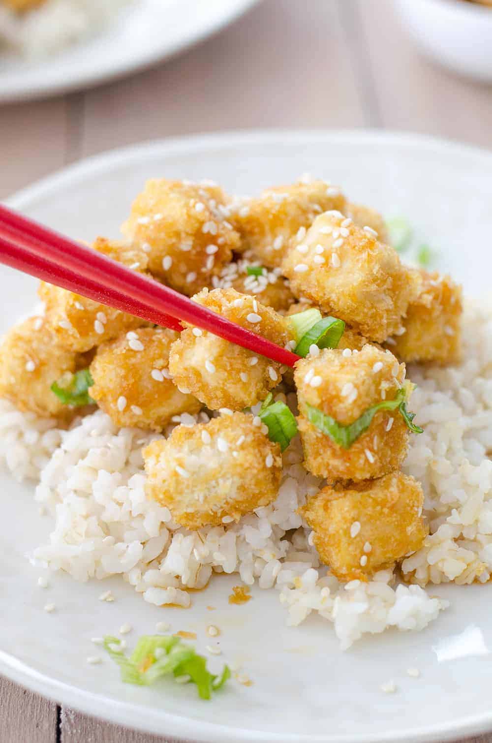 Crispy Honey Garlic Tofu! Better Than Takeout! Crispy Baked Tofu Nuggets In A Sweet Garlic Sauce. Perfect Over Brown Rice Or Steamed Vegetables! Vegetarian. | Www.delishknowledge.com