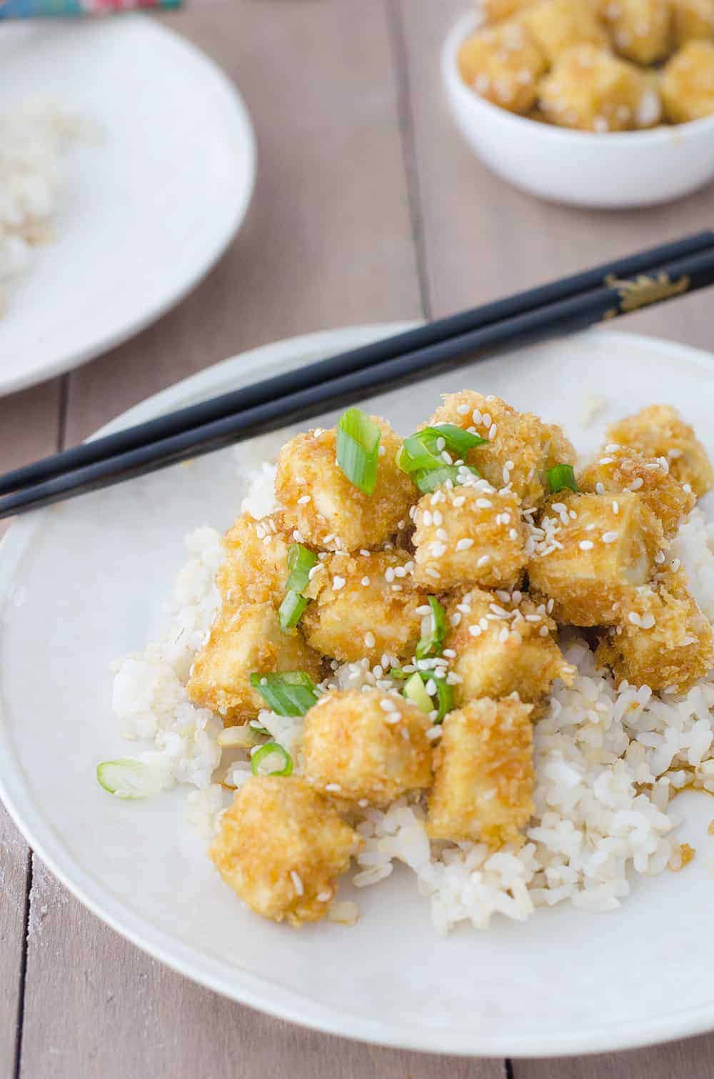 Crispy Honey Garlic Tofu! Better Than Takeout! Crispy Baked Tofu Nuggets In A Sweet Garlic Sauce. Perfect Over Brown Rice Or Steamed Vegetables! Vegetarian. | Www.delishknowledge.com