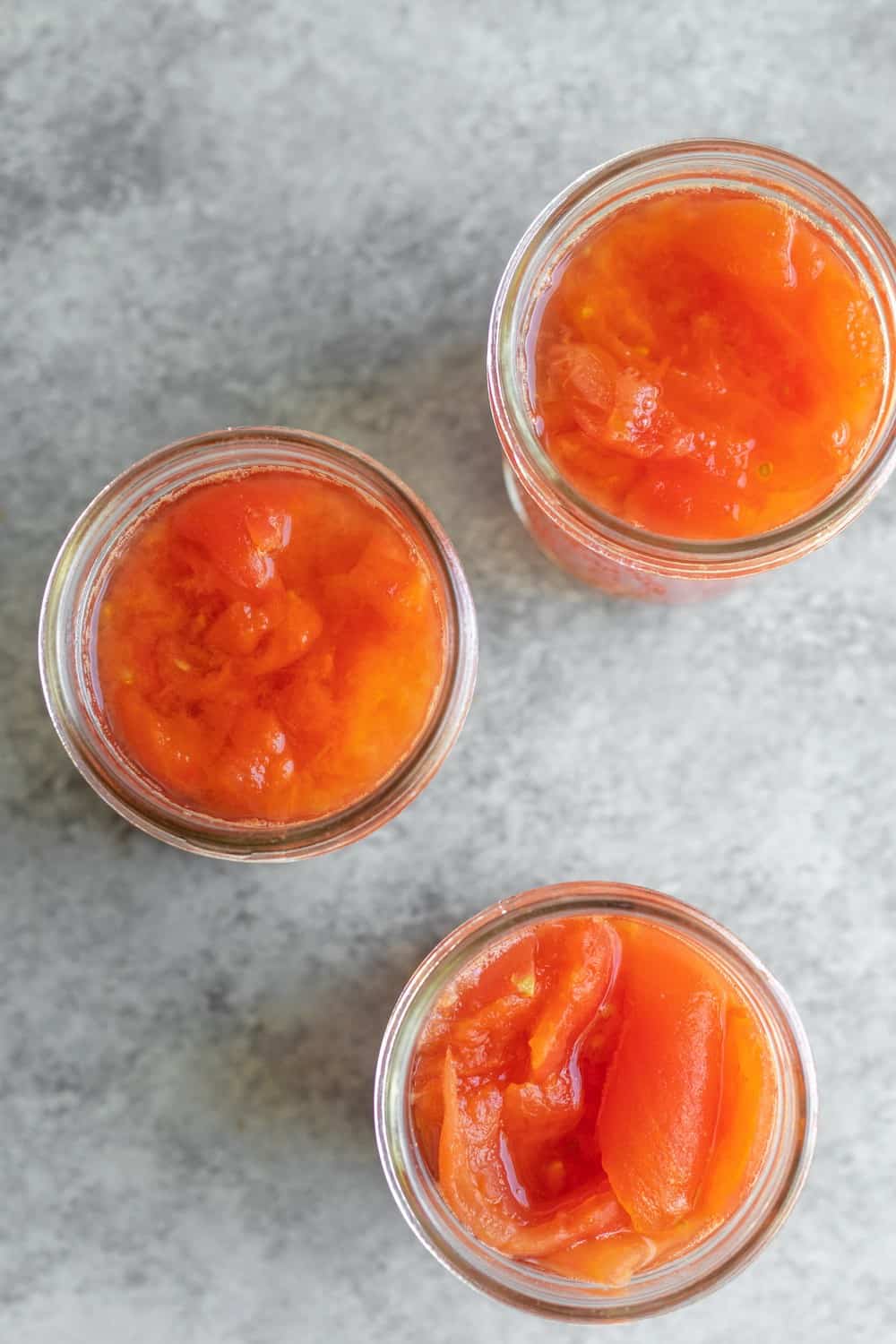 Tomatoes In Jars Before Canning