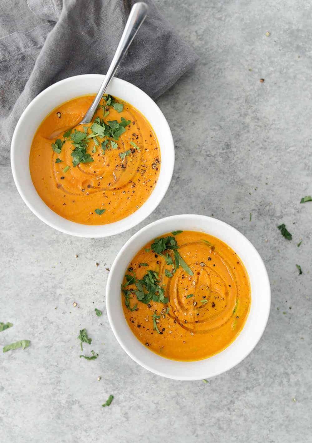 Two Bowls Of Vegan And Gluten-Free Carrot Soup