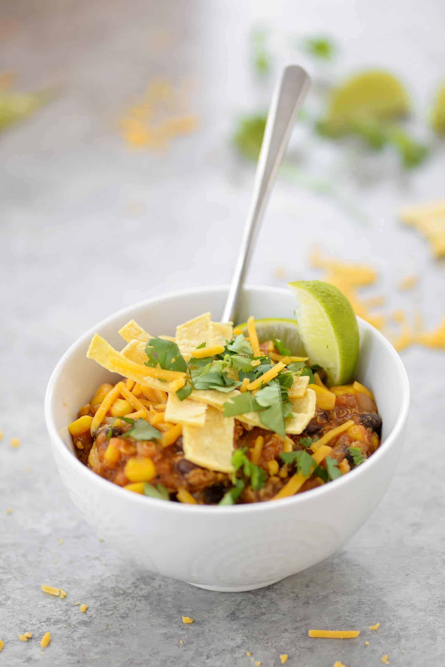 Instant Pot Enchilada Casserole. Yummy, Vegetarian And Gluten-Free! Cooked Quinoa, Beans, Corn And Corn Tortillas In A Homemade Enchilada Sauce. Delicious! #Mexican #Dinner #Recipe #Healthy #Glutenfree #Vegetarian #Quinoa #Weeknight | Www.delishknowledge.com