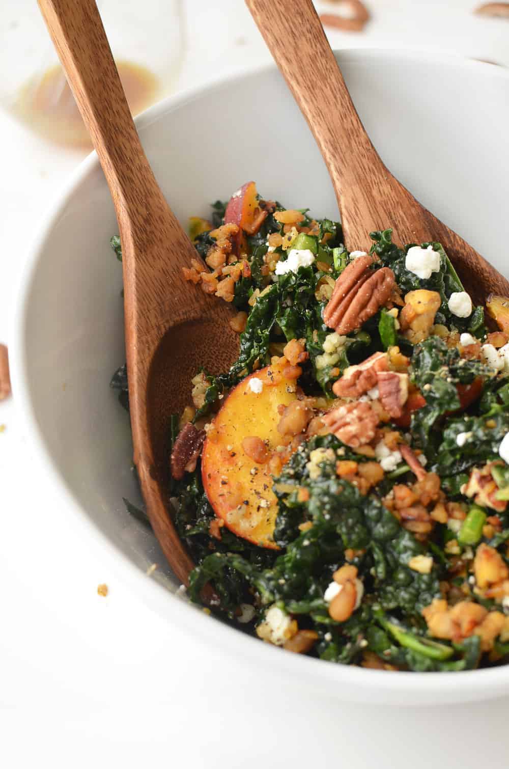 Kale, Peach And Pecan Salad! Topped With Freekah, Crispy Tempeh, Goat Cheese &Amp; Maple-Dijon Dressing. #Vegetarian #Healthy #Salad #Kale | Www.delishknowledge.com