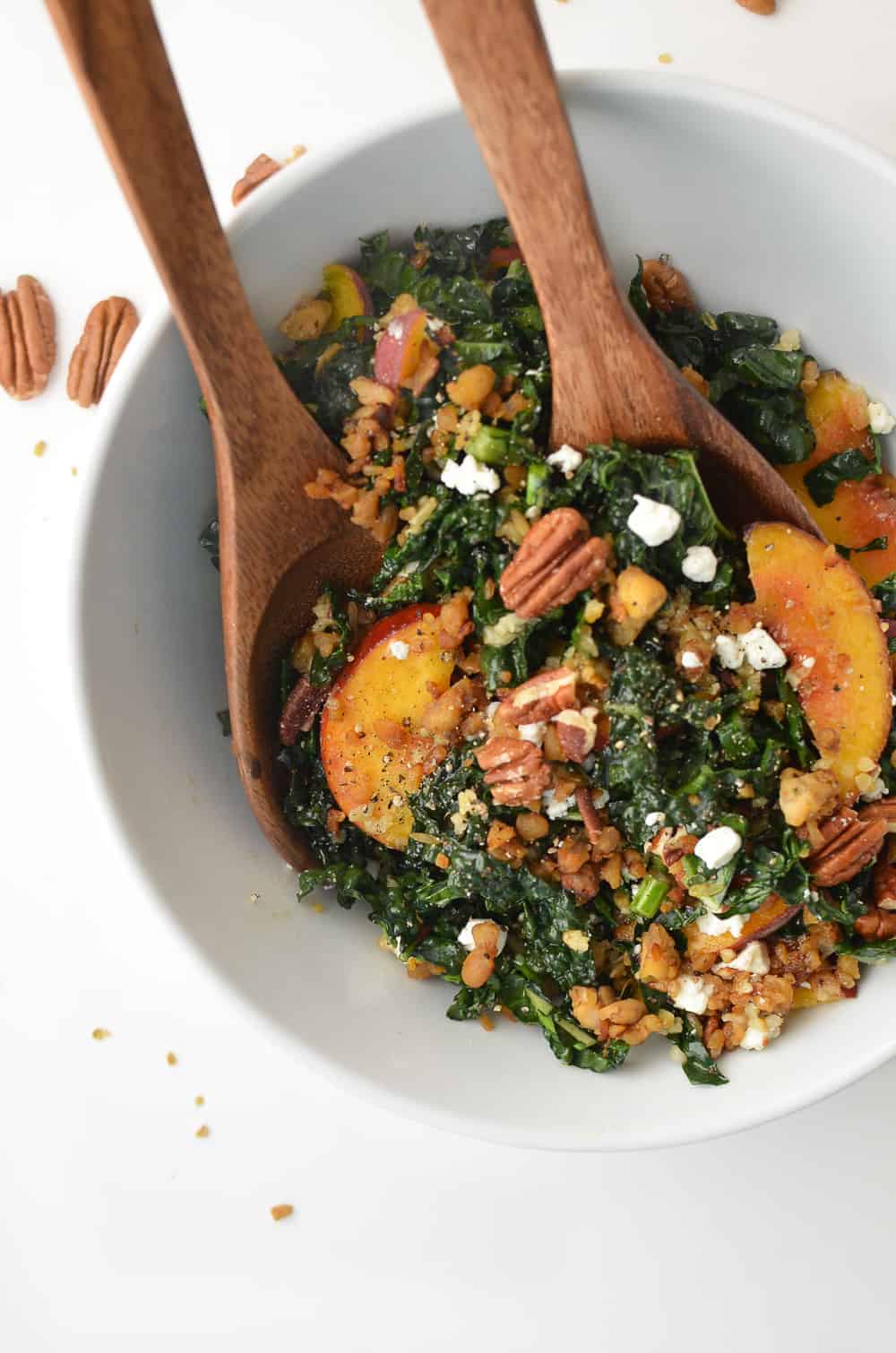 Kale, Peach And Pecan Salad! Topped With Freekah, Crispy Tempeh, Goat Cheese &Amp; Maple-Dijon Dressing. #Vegetarian #Healthy #Salad #Kale | Www.delishknowledge.com