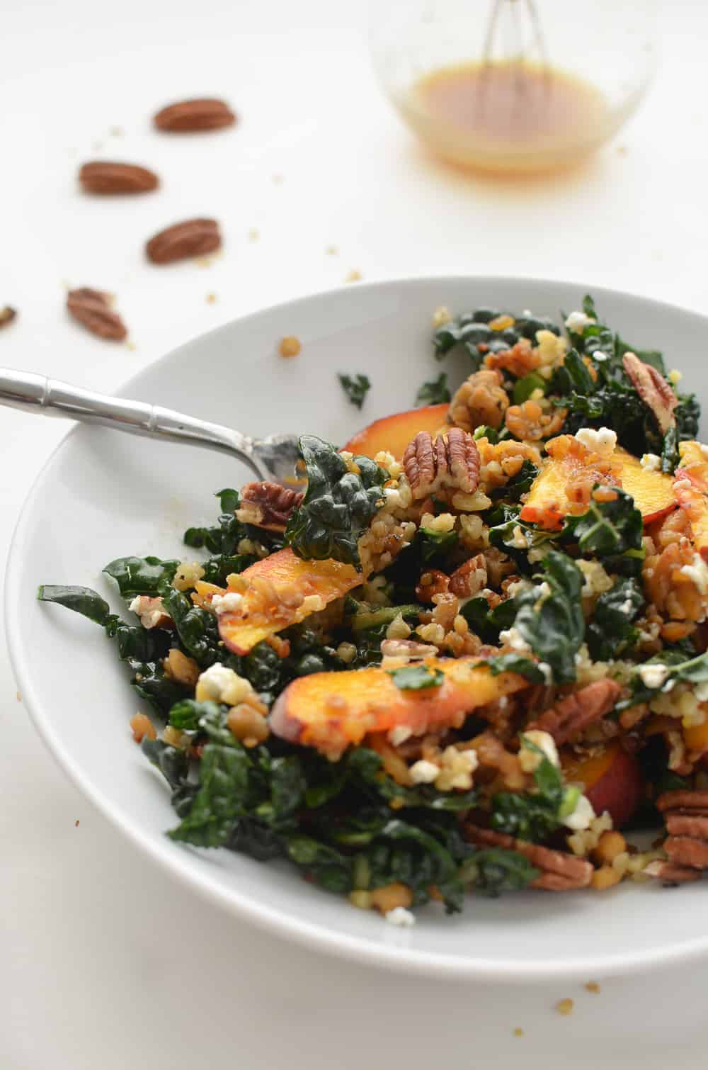 Kale, Peach And Pecan Salad! Topped With Freekah, Crispy Tempeh, Goat Cheese &Amp; Maple-Dijon Dressing. #Vegetarian #Healthy #Salad #Kale | Www.delishknowledge.com