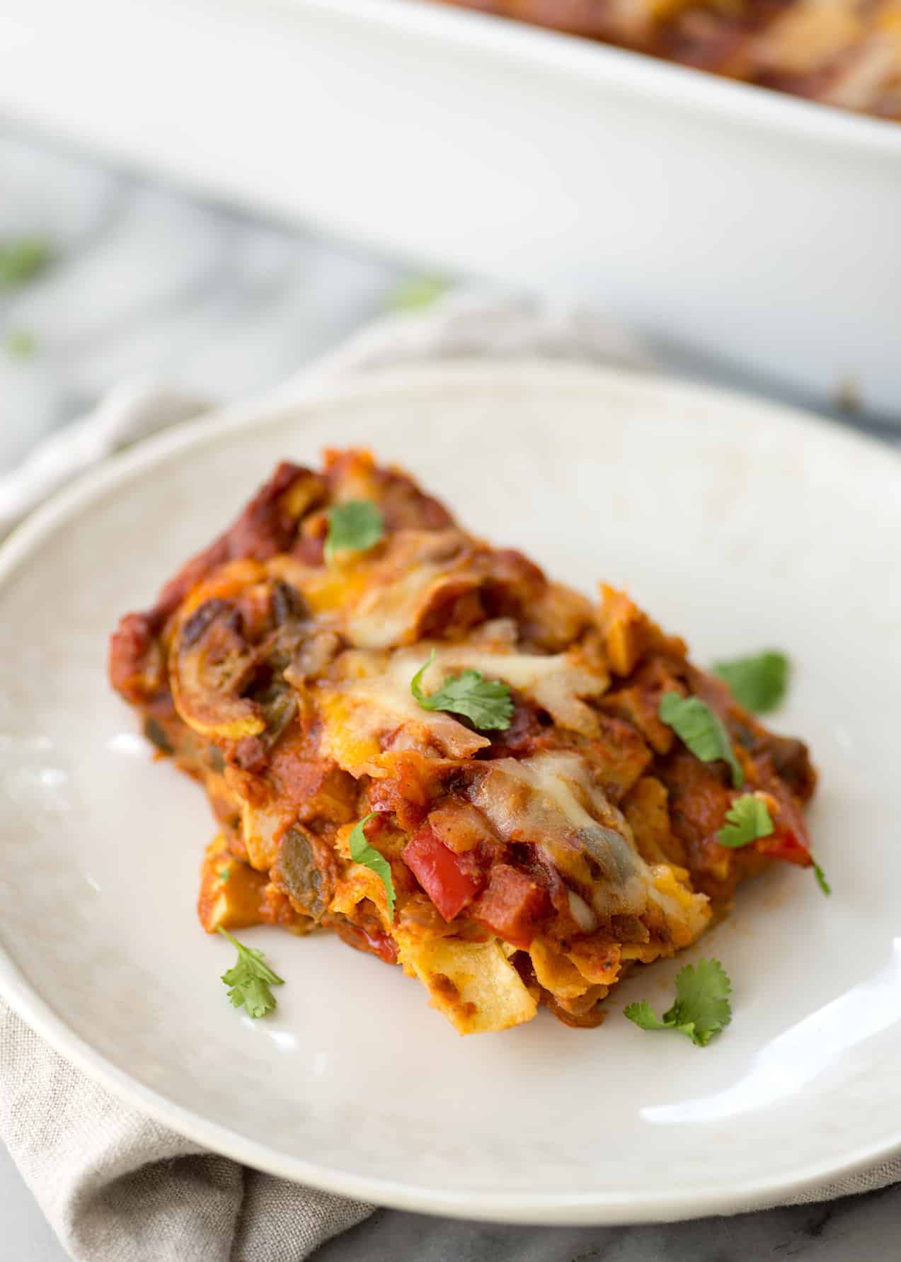 Late-Summer Vegetarian Enchilada Casserole. Layers Of Corn Tortillas, Homemade Enchilada Sauce, Peppers, Squash And Cheese. Vegetarian &Amp; Gluten-Free | Www.delishknowledge.com